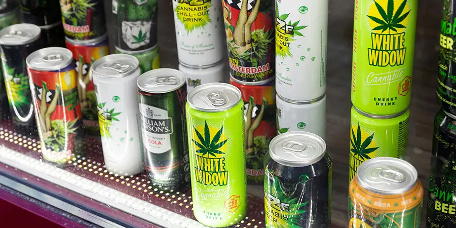 A selection of canned cannabis beverages at a market.