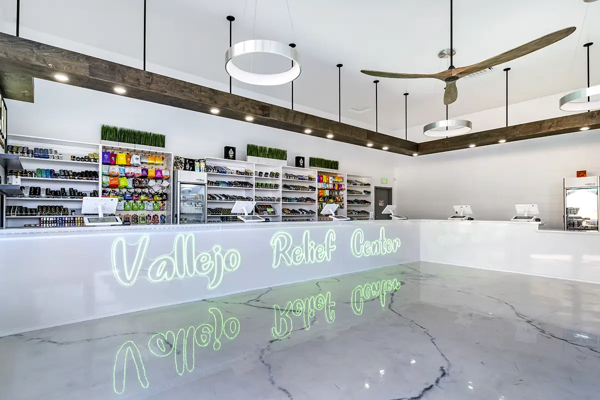 cannabis-dispensary-inside-shop Front view of Vallejo Relief Center dispensary on Springs Road with parking spaces and green cannabis signage.