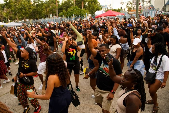 Large crowd celebrating at Vallejo’s Juneteenth Festival with music, dancing, and community energy.