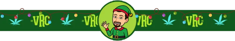 Cartoon image of VRC budtender Danny dressed as a Christmas elf, waving with a big smile, set against a green VRC holiday-themed background with colorful string lights and cannabis leaf designs.