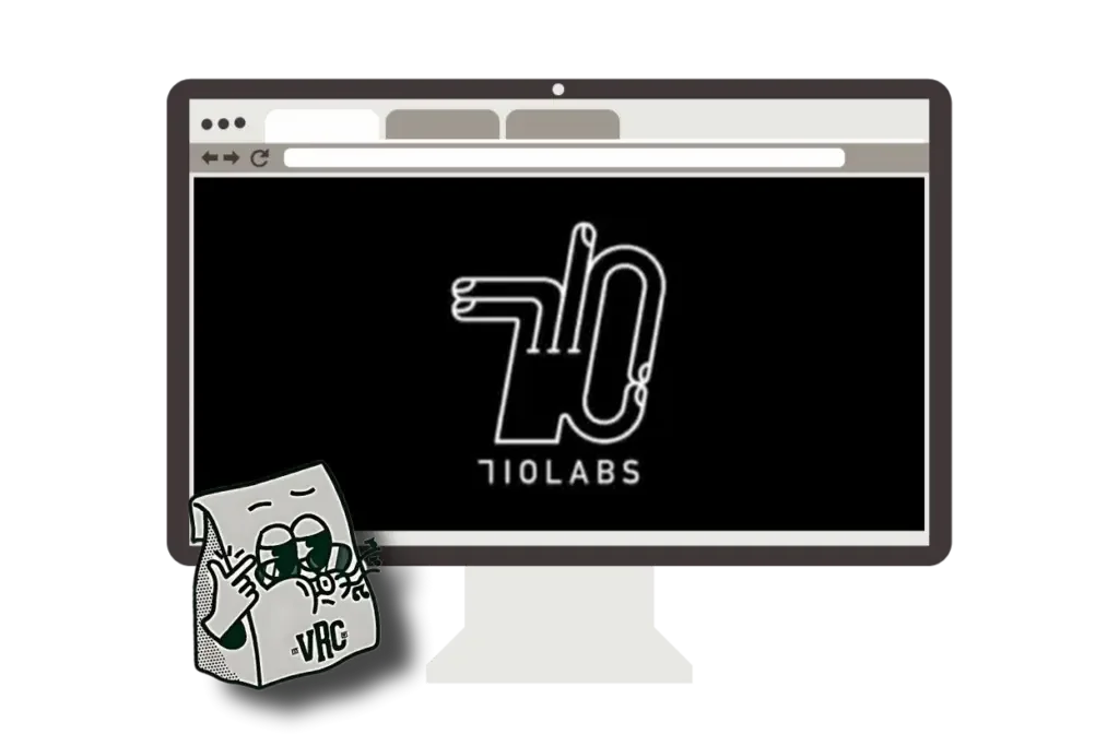 710 Labs logo on a desktop monitor screen, with the VRC bag mascot peeking in from the corner