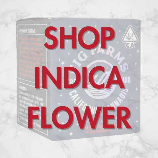 Indica cannabis flower packaging shown from an angle, with prominent red text saying ‘Shop Indica Flower’ over a muted gray product container on a marble-textured background.