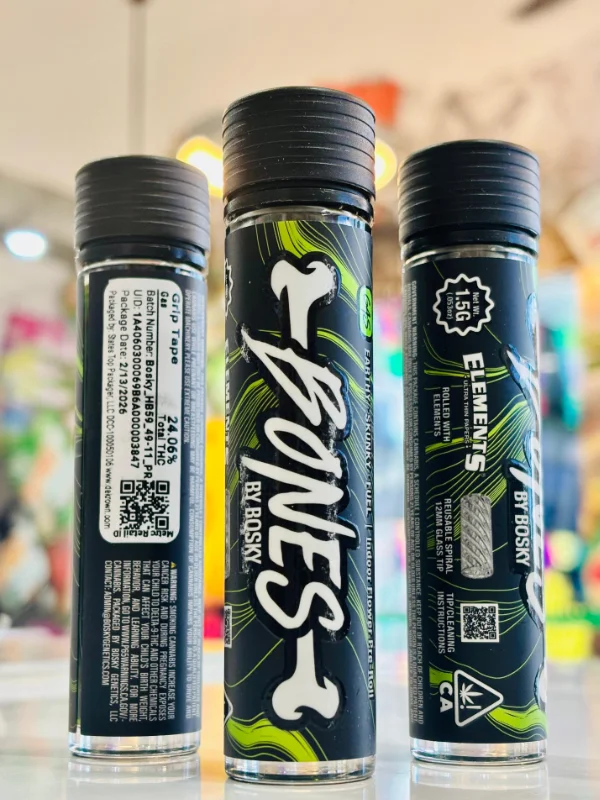 Bosky Bones Grip Tape 1.5g indica preroll with glass tip, non-infused cannabis preroll in premium packaging displayed inside dispensary.