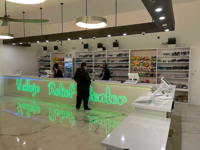 Inside Vallejo Relief Center dispensary in Vallejo, CA where cannabis products are on display and budtenders ready to help at the counter.