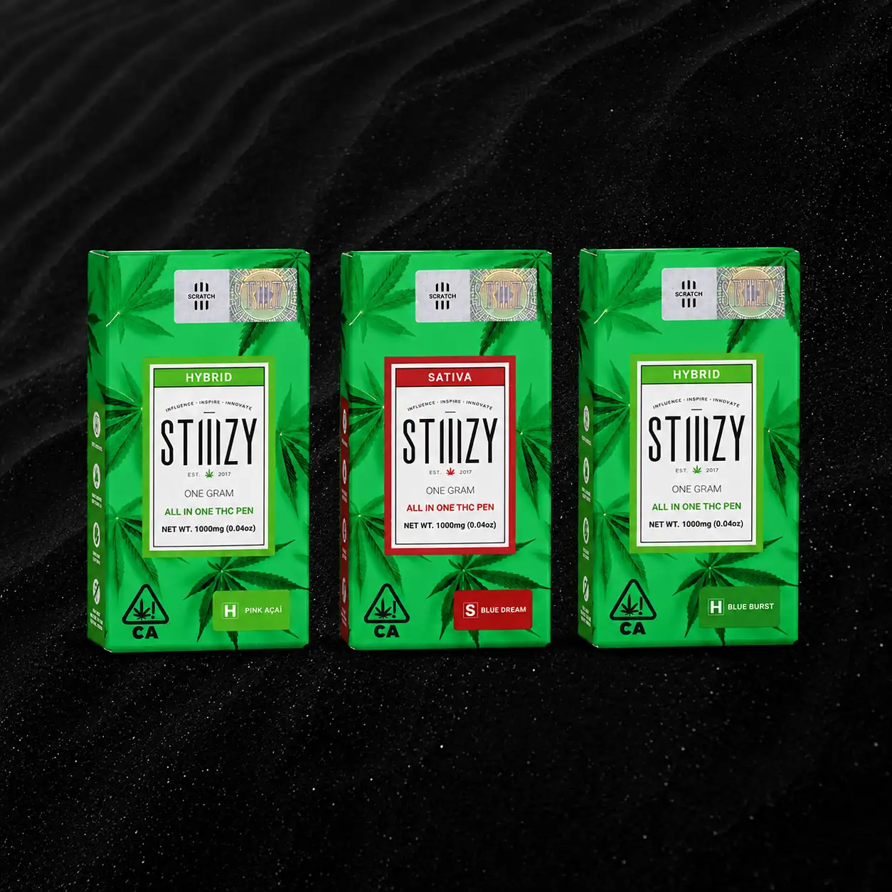 vrc-stiiizy-landing-page-updated-product-highlights STIIIZY Blue Dream sativa, Blue Burst hybrid, and Pink Açaí hybrid 1G all-in-one THC vape pens in green packaging, available at Vallejo Relief Center dispensary
