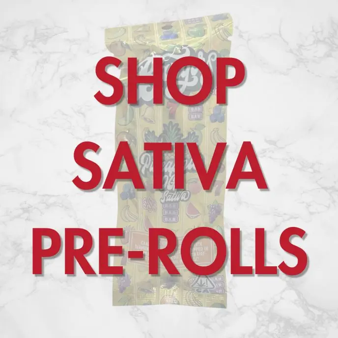 landing-page-shop-sativa-prerolls Sativa pre-roll ad with colorful cannabis packaging and ‘Shop Sativa Pre-Rolls’ text overlay on marble background — Vallejo Relief Center promo image.