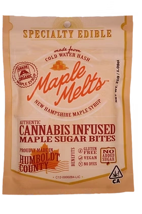 Peach-colored pouch of Maple Melts, maple sugar bites made with cold water hash and New Hampshire maple syrup