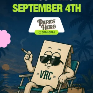 Nighttime beach scene promoting VRC's Papa's Herb demo on September 4th from 3-6PM, the smiling bag character reclines seaside with a joint in hand and palm trees silhouetted behind